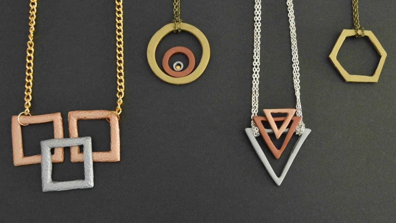 A necklace made from geometric shapes in various shades of metal, inspired by the Cubist movement.