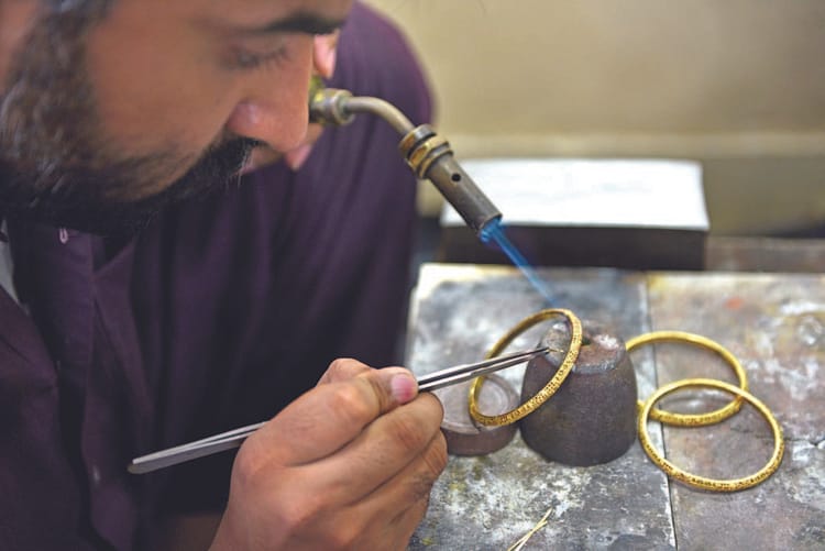 jewellery-maker-working-with-gold-and-silver.jpg