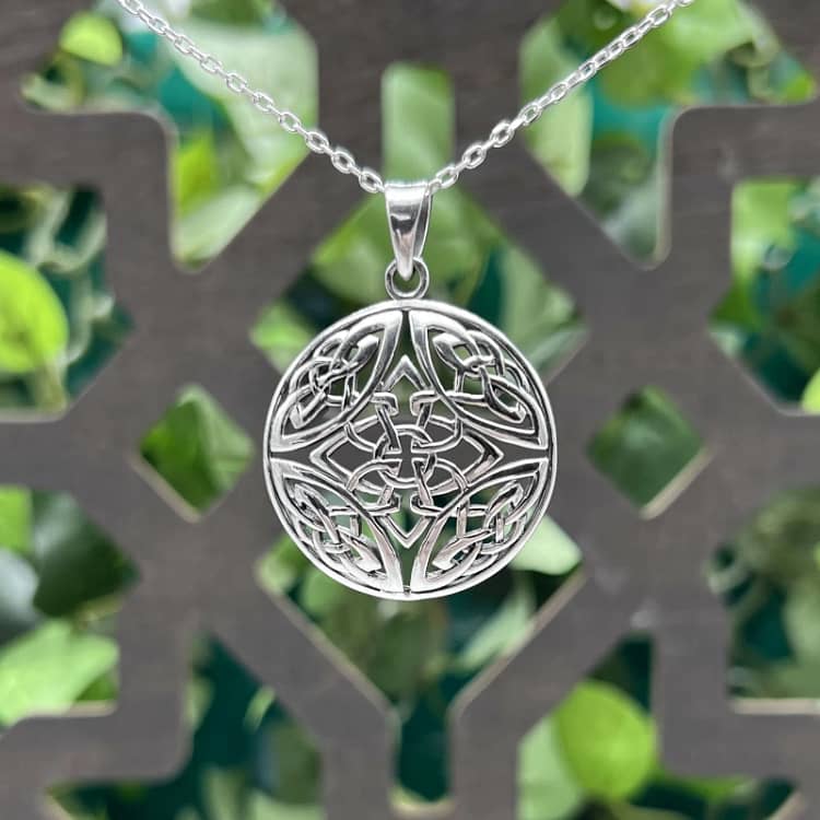 Celtic necklace with intricate knotwork designs.