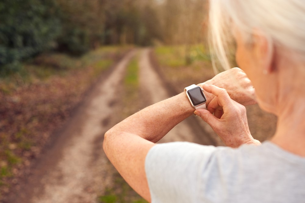 A-senior-using-a-smartwatch-before-going-on-a-run