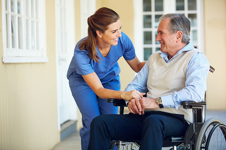 caregiver demonstrating patience and understanding with an elderly patient